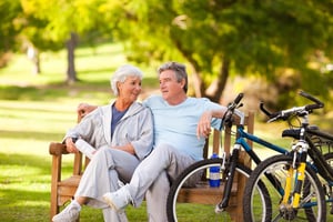 Elderly couple with their bikes