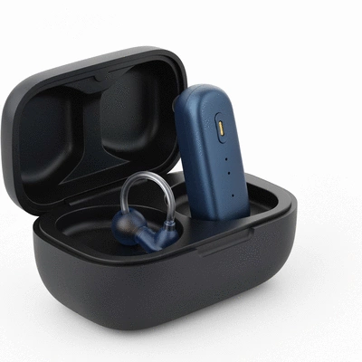 Close-up of a modern hearing aid in a sleek charging case, clean background